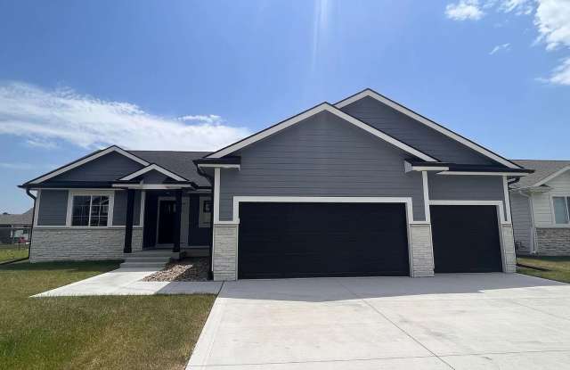 "Contemporary Ranch-Style Living: Immaculate Home with Covered Deck in West Des Moines." photos photos