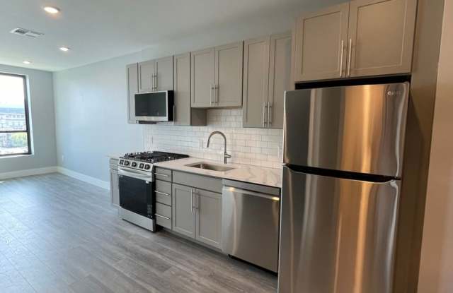 1BR with In-Unit Laundry | Roof Deck Gallery 4