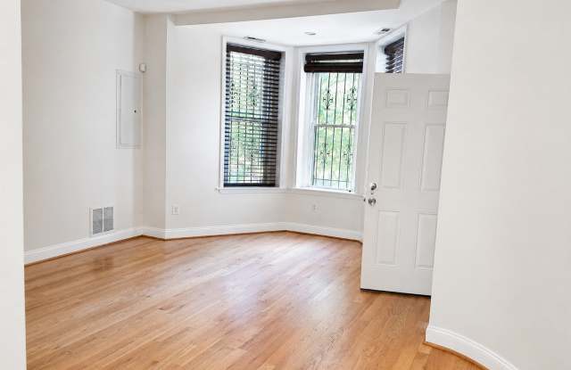 Updated One-Bedroom with In-Unit Laundry and Private Porch Near Shaw Gallery 3