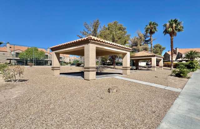 Welcome to this inviting 2-bedroom, 2-bathroom single-story condo Gallery 4