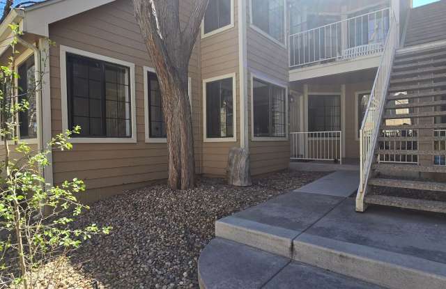 Bright Ground-Floor 2BR/1BA Condo features Garage, Covered Patio  Community Pool photos photos