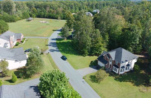 Gorgeous Fluvanna Home located in Sycamore Square, just outside the Gate near Lake Monticello with new paint & Laminate floors! Garage, Basement & half acre lot! Gallery 3