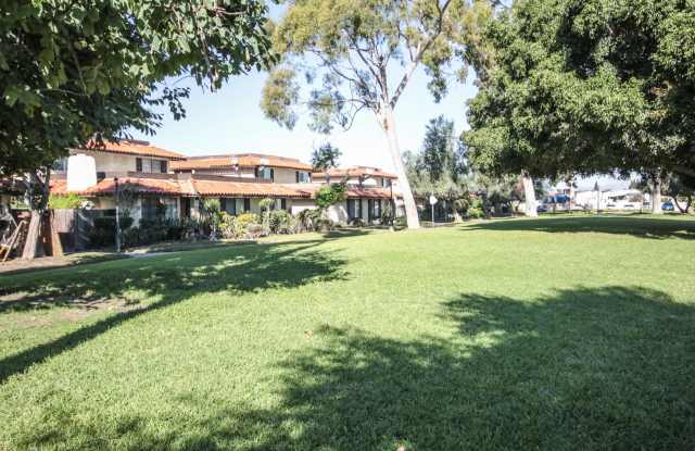 Stylish Corsican Village Retreat with Garage, Patio  Modern Convenience - 3951 West McFadden Avenue, Santa Ana, CA 92704