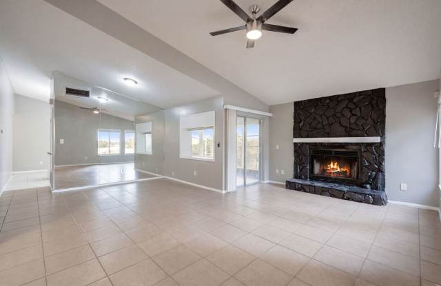 Freshly painted, spacious, 3bdm/2ba home with fireplace and laminate flooring throughout. Gallery 3
