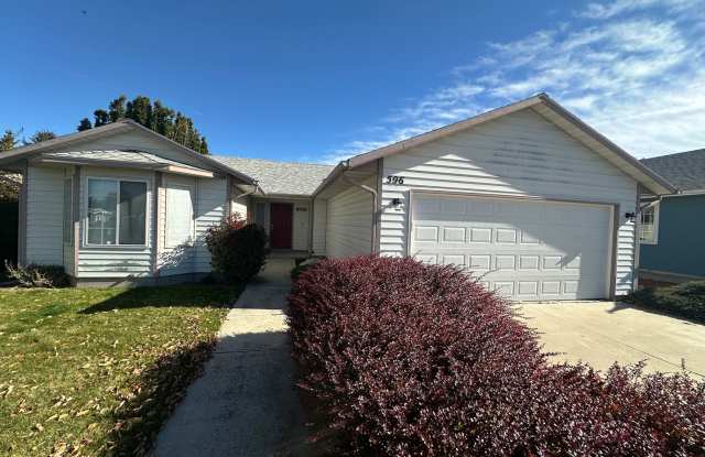 Tranquil  delightful 3-bedroom, 2-bathroom home that offers both comfort and convenience with its prime location, updated features, and charming ambiance. This home is a true gem waiting for you to make it your own. - 596 South Gamay Lane, Boise, ID 83709