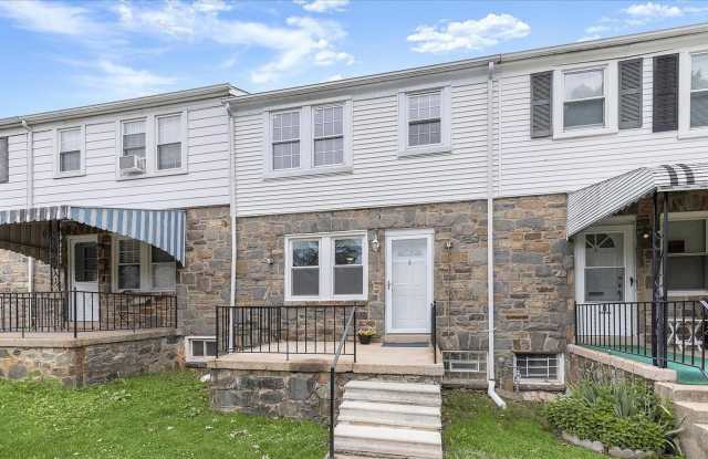 Updated 3BR Catonsville Townhome | Rear Off-Street Parking | Deck + Covered Porch | Stainless Kitchen photos photos