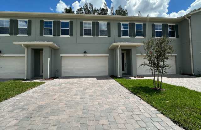 Modern 4BR/2.5BA Townhome | LVP Throughout | Lawn Care Included photos photos