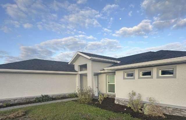 * COMING SOON * 4 Bedroom 2 bathroom NE Cape Coral Home with Screened Lanai photos photos