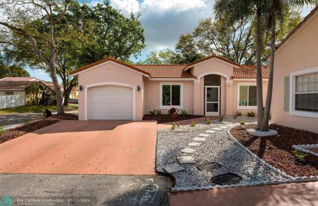 4256 NW 61st Ct - 4256 Northwest 61st Court, Coconut Creek, FL 33073