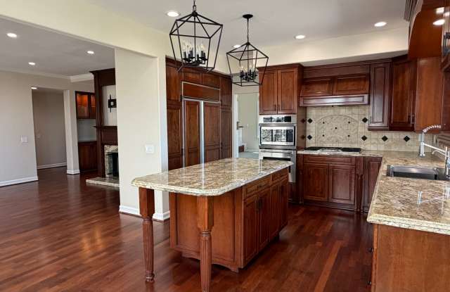 Ready Now: Spacious 4 Bedroom 3 Bath with Bonus Room and 3 Car Garage Gallery 1