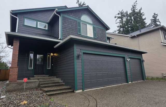 Spacious, Updated Puyallup Home with 3-Car Garage  Large Trex Deck! - 13214 110th Avenue Court East, South Hill, WA 98374