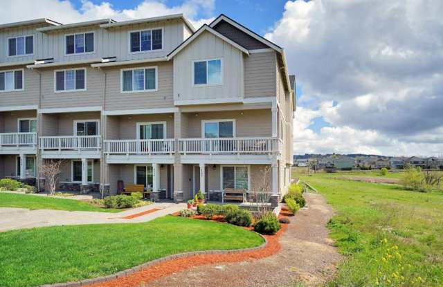 Modern 3-Bedroom End-Unit Townhome with 2 Balconies, Granite Kitchen  Oversized Tandem Garage! photos photos