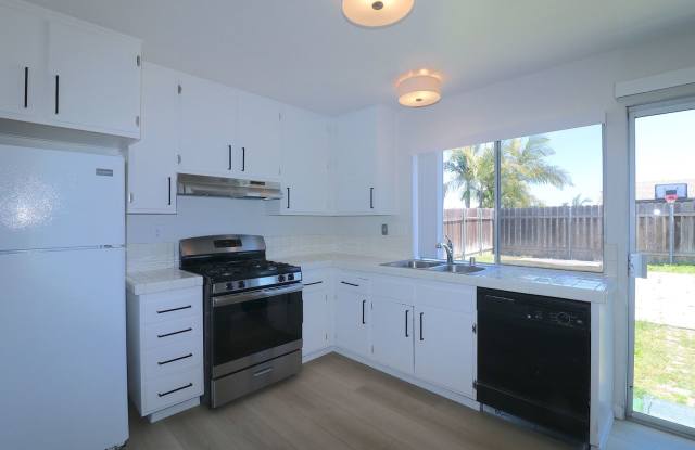 Come check out this 2/2 house in Mira Mesa! Large yard, garage/ driveway. Laundry in house! Vinyl flooring photos photos