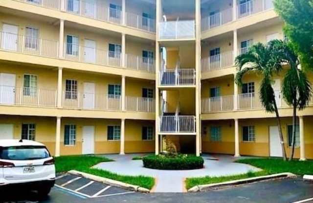 6930 NW 179th St - 6930 Northwest 179th Street, Country Club, FL 33015