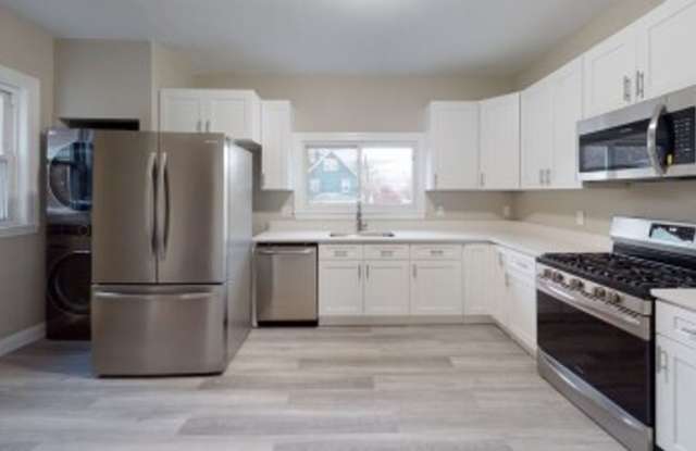 Renovated 6BR with In-Unit Laundry, 3 Parking Spaces & Commuter Rail Access Gallery 1