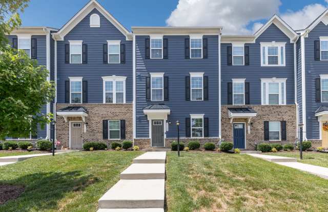 Luxurious three-story townhome with owner's suite and high-end finishes photos photos