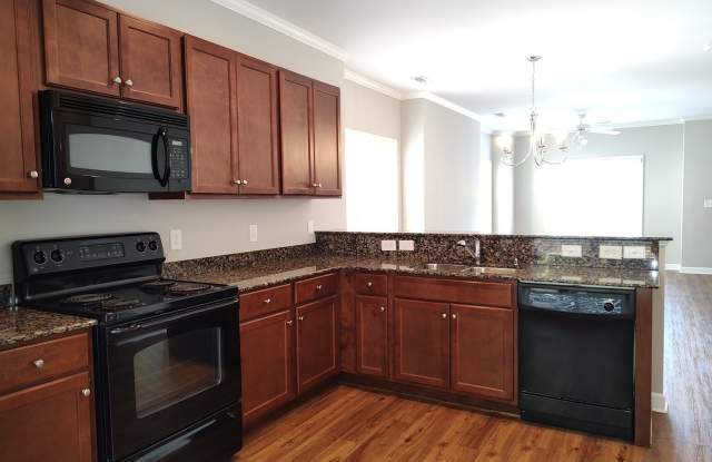 Corner Unit Townhome located in the Village Park Community! Gallery 4
