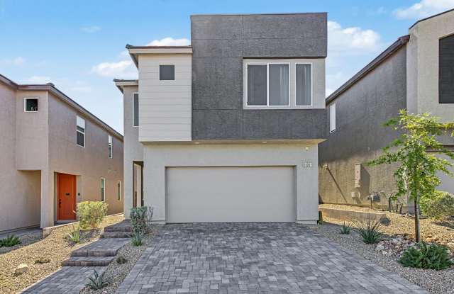 5-Bedroom Home for Rent in Gated Kyle Canyon Community | Downstairs Bedroom | Modern Kitchen Gallery 1
