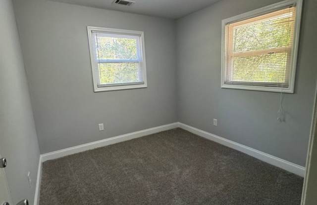 Freshly Updated 4-Bedroom Brick Home with Spacious Yard! 1/2 off 1st months rent Gallery 4