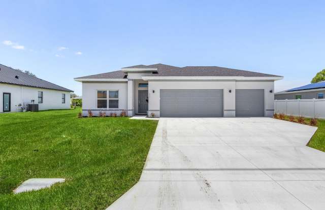 Brand-New Cape Coral Home with 3-Car Garage & Luxury Upgrades! photos photos