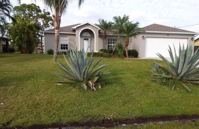 6125 NW East Deville Circle - 6125 Northwest East Deville Circle, Port St. Lucie, FL 34986