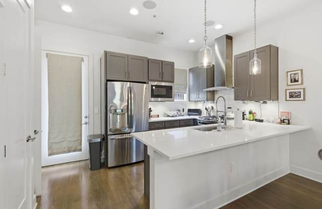 NEW PRICE in 12 South/Berry HIll Living- Close to WeHo — Modern 3BD/3.5BA Townhome with 2 Car Garage. Washer Dryer Included | $3375 Per Month Rent Gallery 1