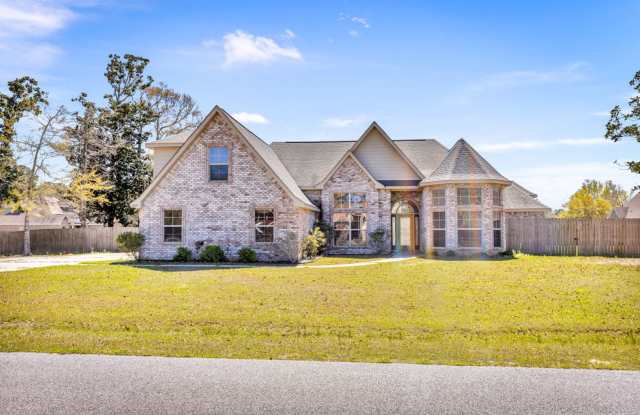 Welcome to 6201 Palmetto Pointe Drive, a spacious 5-bedroom, 3-bathroom single-family home offering 2,828 square feet of comfortable living space. photos photos