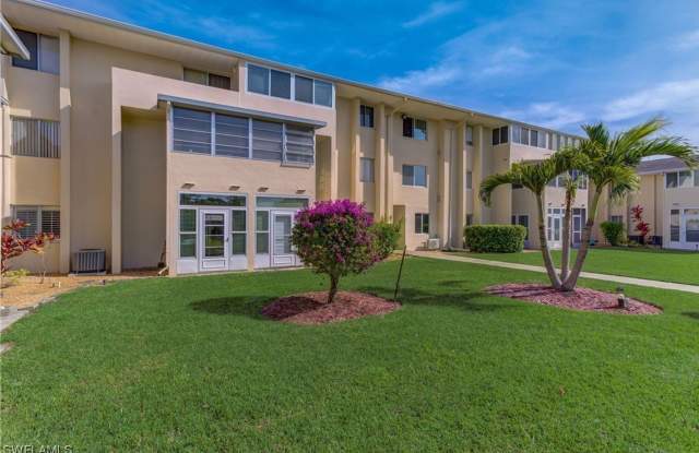 55+ Charming first-floor condo nestled in the serene Fairways 3 Condominiums photos photos