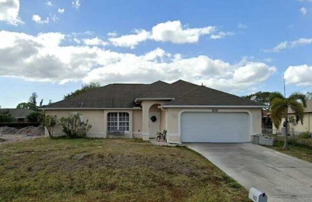 FIRST MONTH'S RENT FREE! STUNNING 4/2/2 IN NW CAPE! photos photos