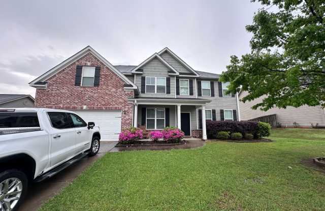 Welcome to this spacious 6 bedroom, 4 bathroom home located in the desirable Grovetown, GA area. photos photos