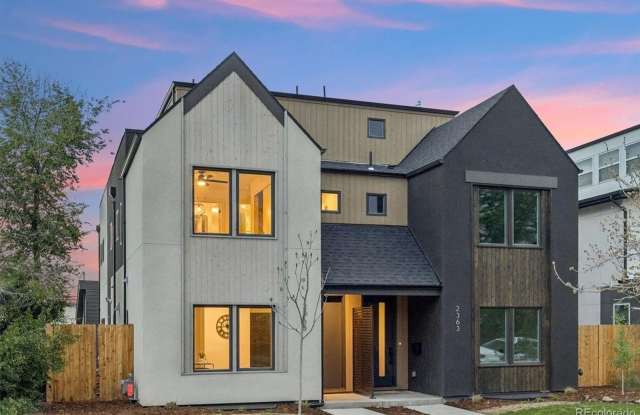 Brand-New Modern 4BR Home with Rooftop Deck & Mountain Views in Overland Gallery 1