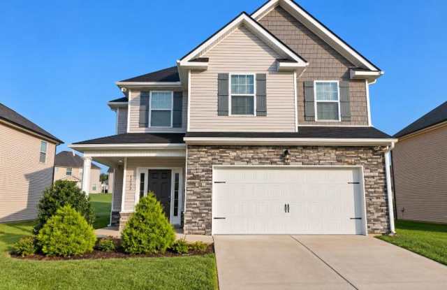 Get ready to fall in love—this sleek, modern beauty in West Creek Farms is bringing the wow factor to Clarksville! photos photos