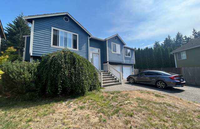 Beautiful 4 bd 3 bath w/ 2-car Garage Home in Puyallup! photos photos