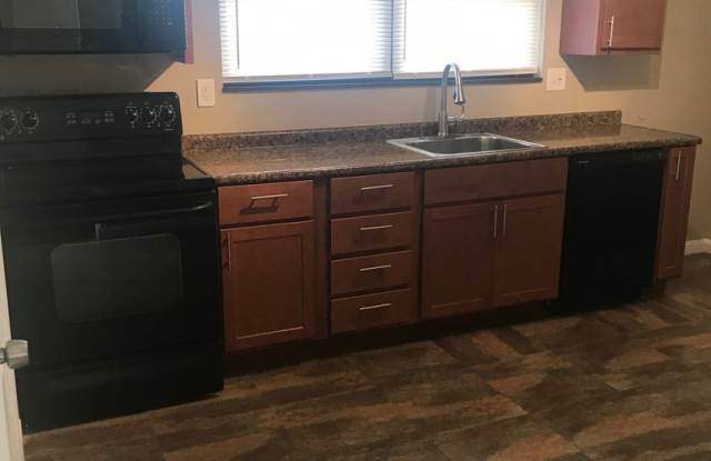 COMING SOON! Spacious Brick Rehab Home on Lilac, Rich Hardwoods, New Kitchen & Bath Gallery 4