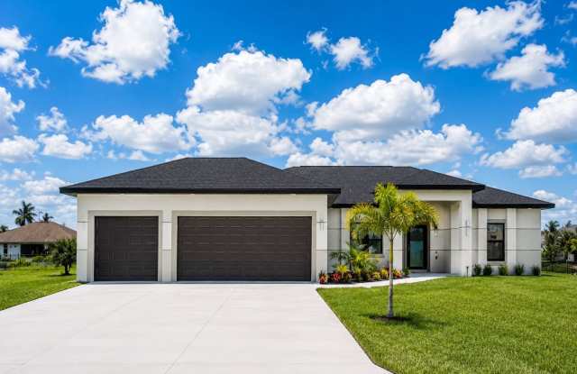 Brand-New Luxury Home with Office, 3-Car Garage & Designer Upgrades | Modern Living in Cape Coral! photos photos