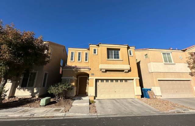 Charming 3 bed/2.5 bath single-family home in the heart of Blue Diamond! Tiled, downstairs entryway leads to combined kitchen and living room. Upstairs is bathed in natural sunlight, lots of accent windows and wood-rail staircase! photos photos