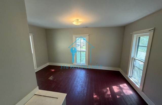 $1,199 | 4BR Farmhouse w/ Detached Shop, Creek Access & New HVAC | Newton Gallery 3