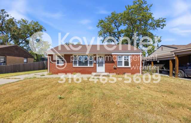 Charming 3-Bedroom Home with Detached 2-Car Garage & Fenced Backyard photos photos