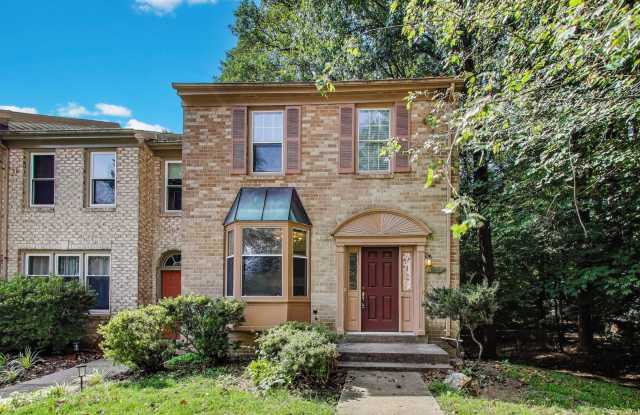 Beautiful brick end unit townhome! 3BR, 3.5 BA with wooded views! photos photos