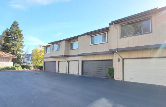 Upstairs Condo with 2 Car Garage, Fresh Paint, Wood Floors, Large Patio, Pool! photos photos