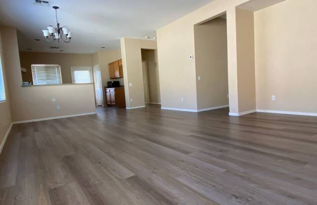 Beautiful plank flooring in this 4 bedroom home in Avondale Gallery 3
