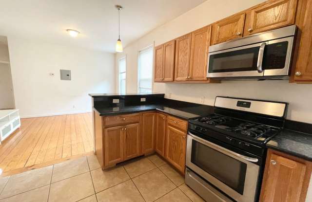Beautiful 4-Bed on Delle Ave — Newly Renovated | In-Unit Laundry | Prime Mission Hill Location Gallery 3