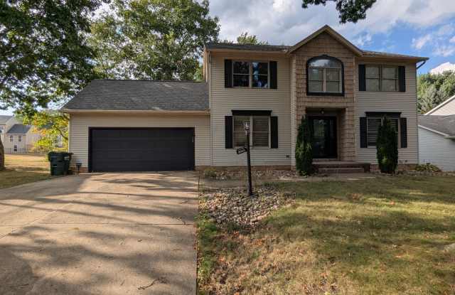 Welcome to your new home in the Heart of Plain Township. photos photos
