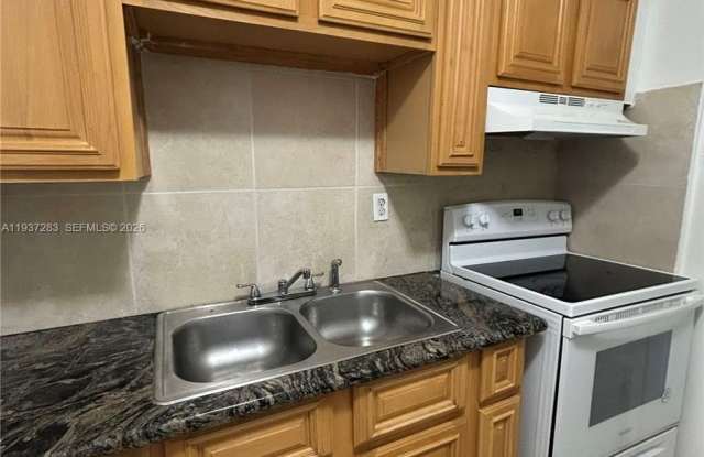 1220 NE 110th Ter photos photos