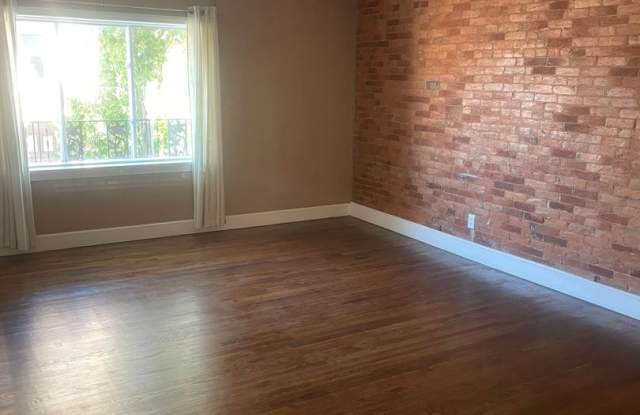 Charming Downtown 1-Bedroom Apartment with Character  Convenience! photos photos