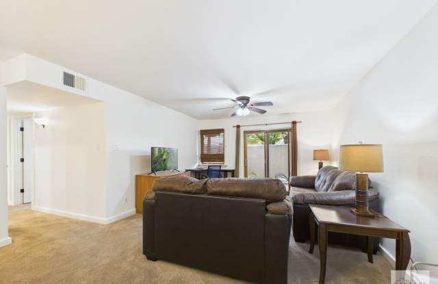 Fully Furnished or Unfurnished Ground Level Condo Available Now! Gallery 1
