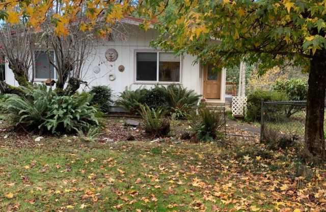 Peaceful Country Living – Beautiful 2 Bed, 2 Bath Home with Large Deck Gallery 1