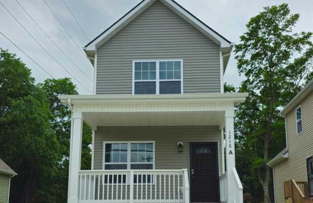 1 Year of FREE Alarm Monitoring! 2 Bedroom with 2.5 Bath House! Available Now! photos photos