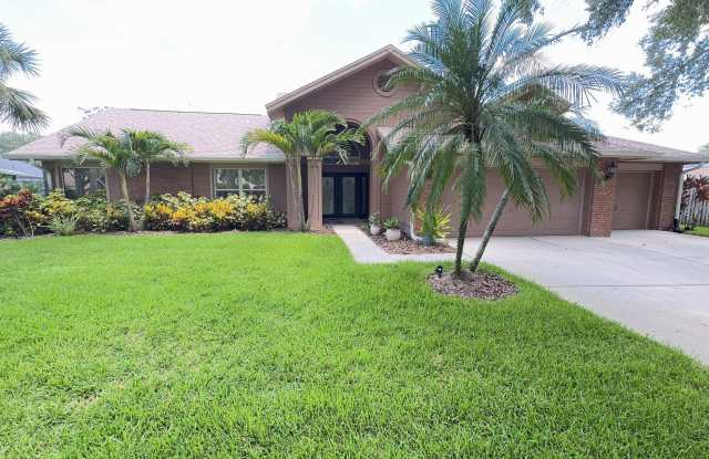 For Rent: A dazzling 5-bedroom, 3-bathroom sanctuary in the coveted gated community of Hunter's Green! photos photos