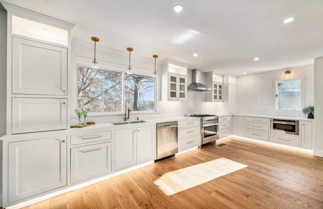 Renovated Lakefront 5 Bedroom Home with 2 Garages! - 224 Northwest Locust Street, Lee's Summit, MO 64064